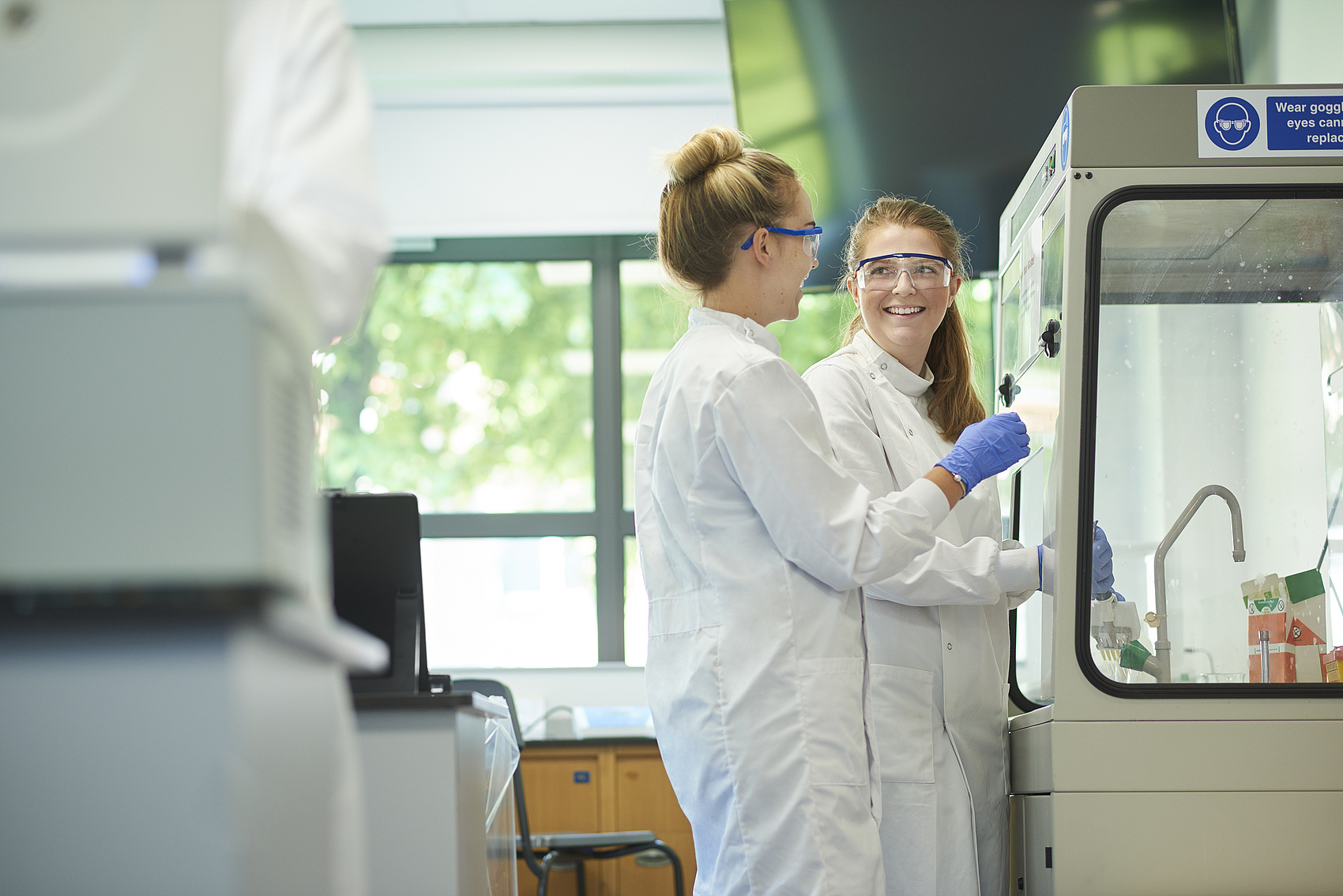 Researchers working in a laboratory environment